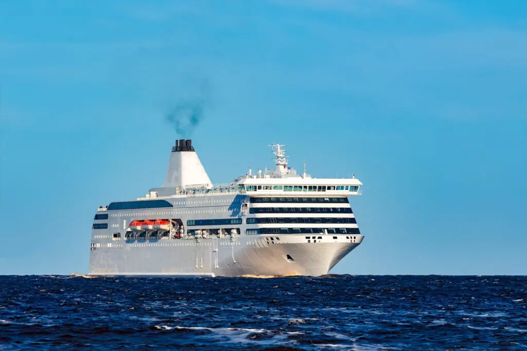 White passenger ship underway